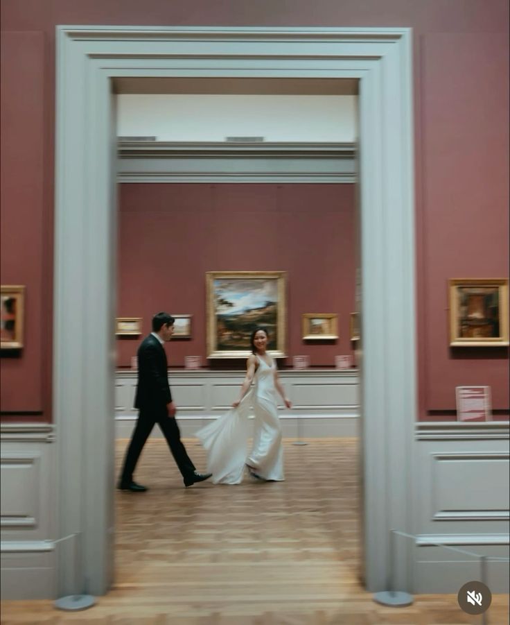Romantic prenup photography session at a museum with natural light