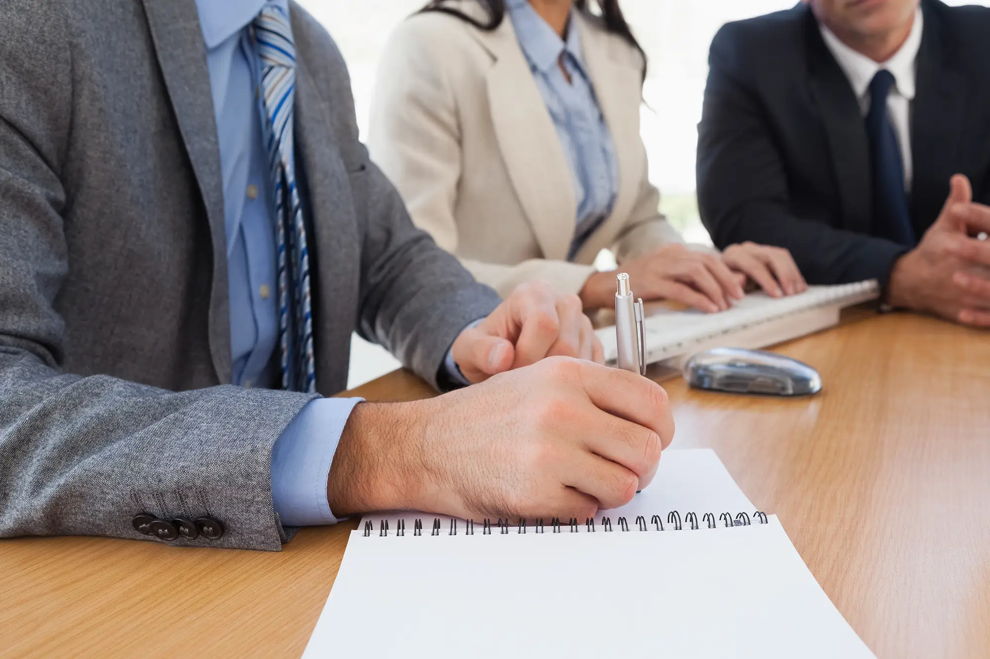 Financial adviser discussing long-term wealth strategy with clients