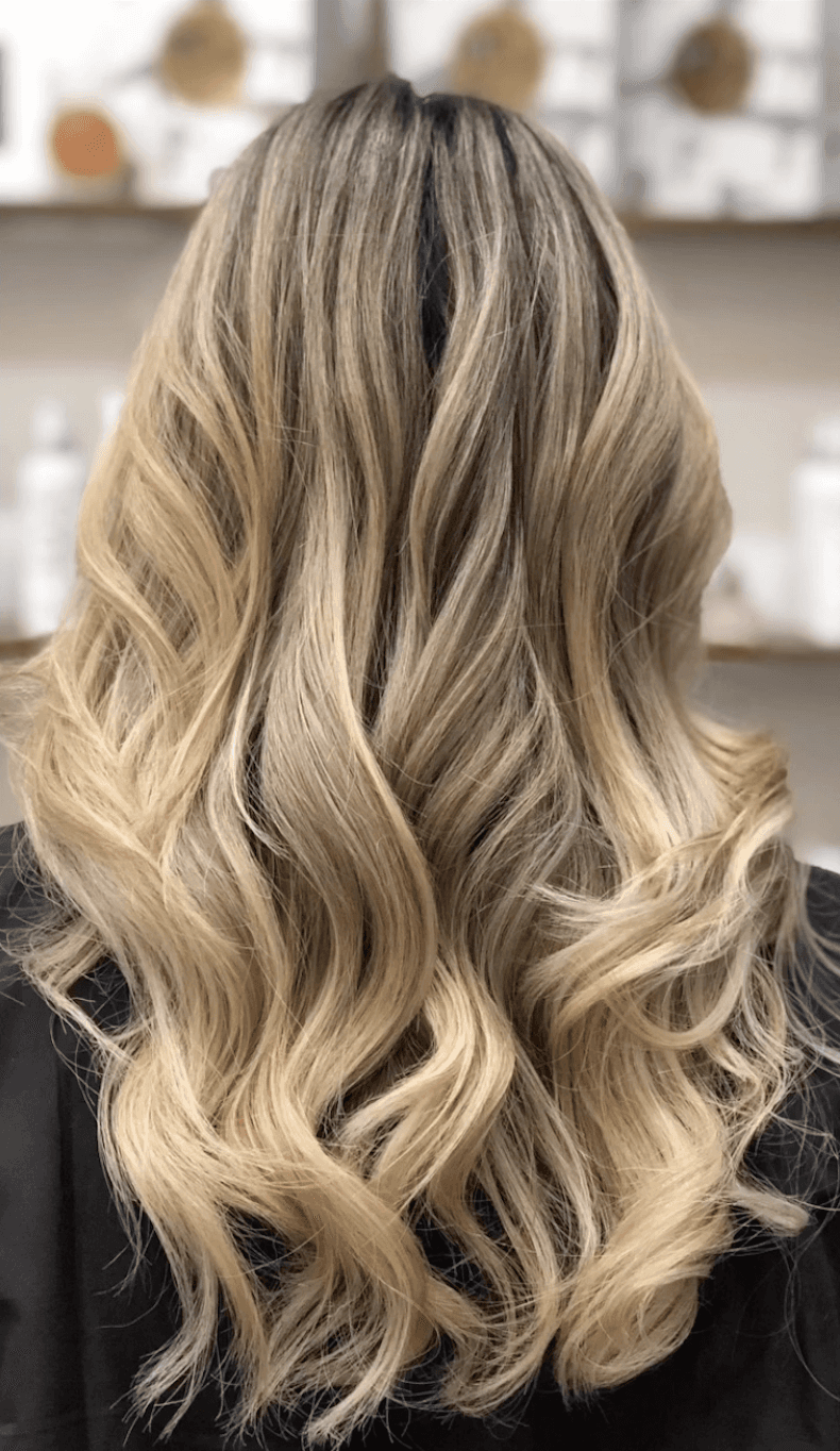 Lived-in blonding and extensions at Del Sol Hair Studio in Huntington Beach
