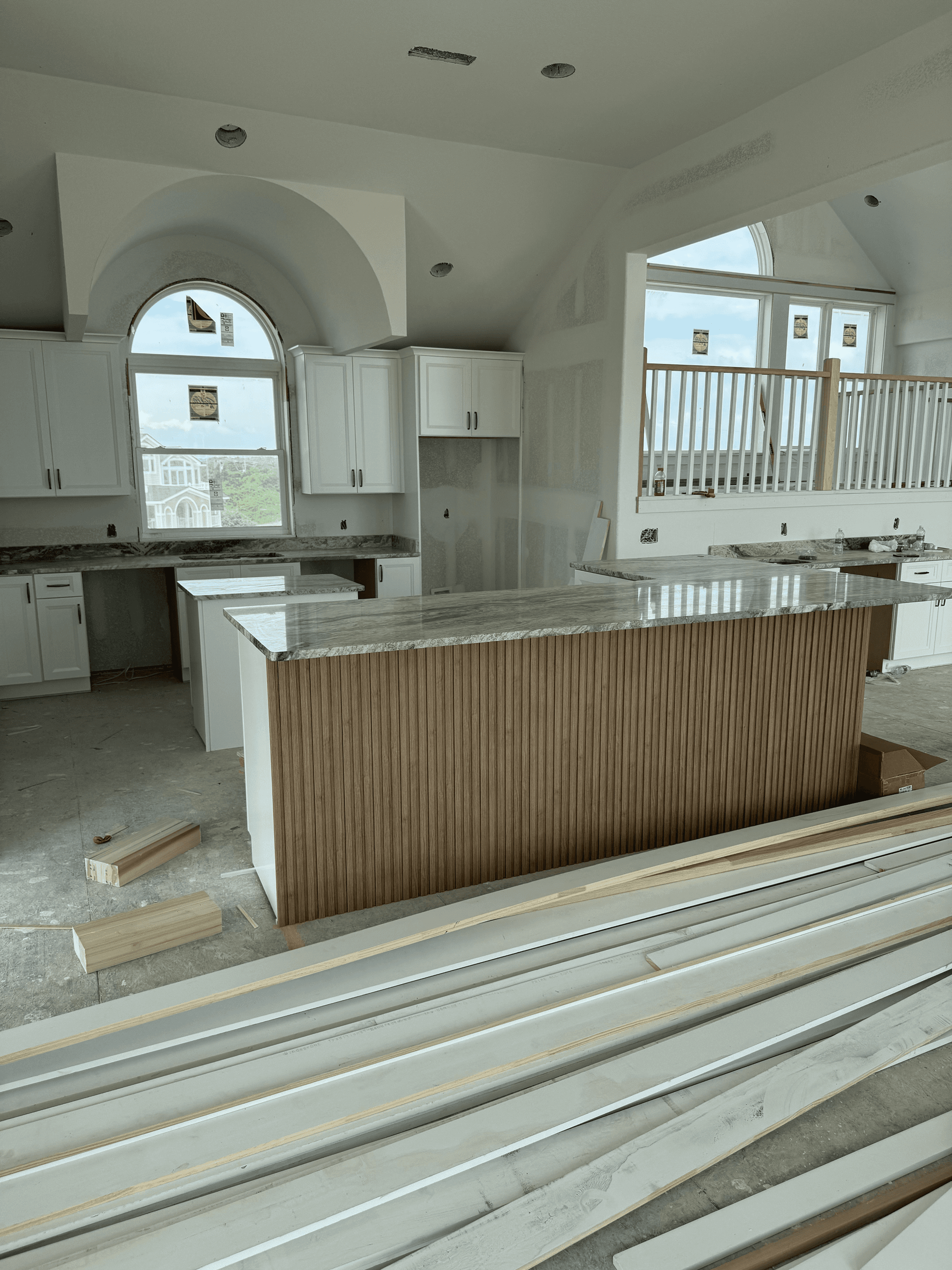 two brown wooden chairs