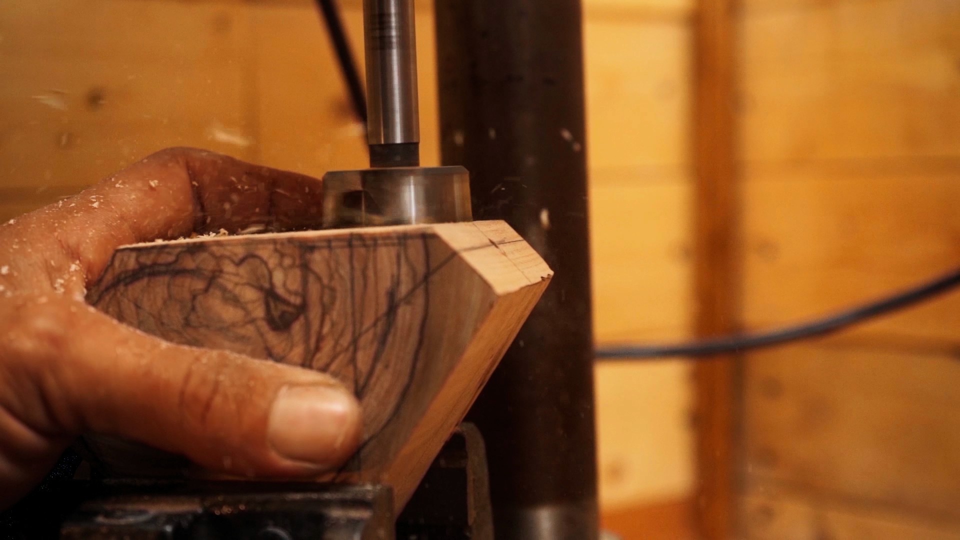 The pipe maker in his studio working on a new pipe