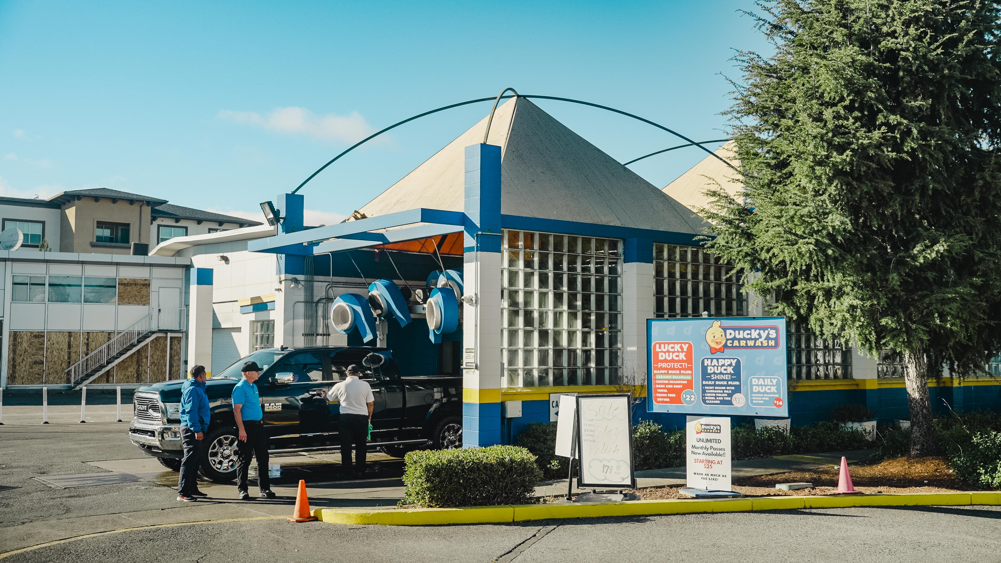 Artistic portrait with red and blue lighting creating a dramatic effect