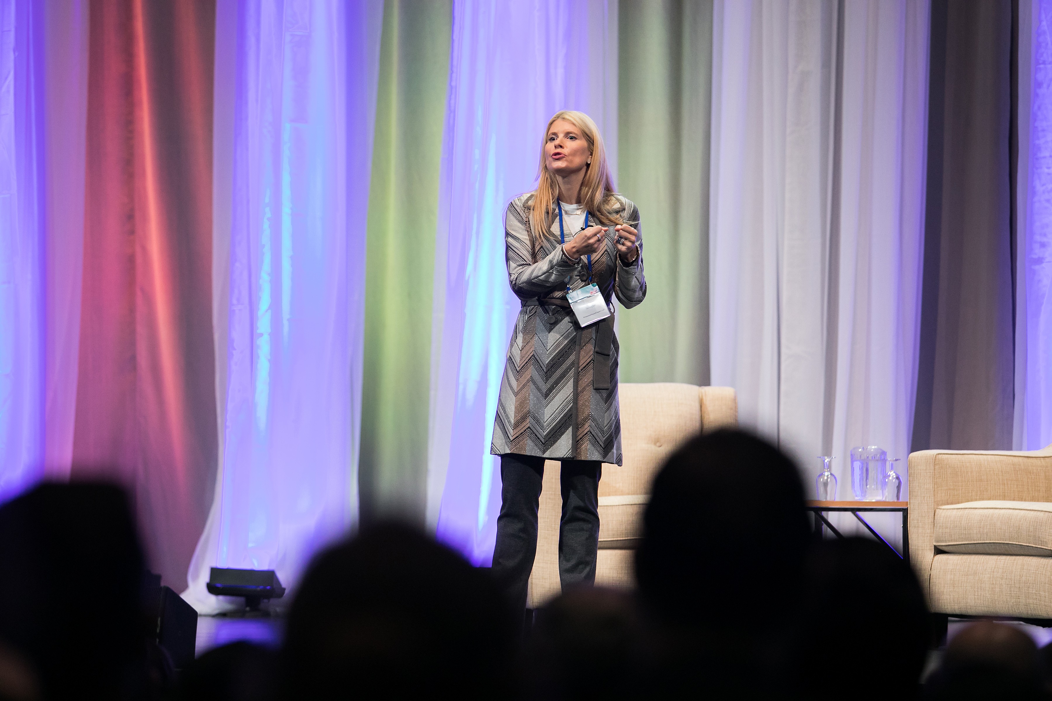 Shannon Schuyler, Chief Purpose Officer at PwC, speaking onstage at the 2017 Net Impact Conference during her keynote session.