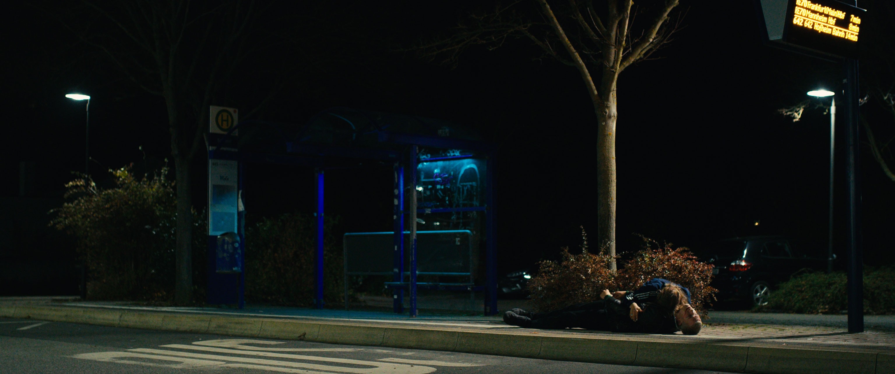 bus stop with two people