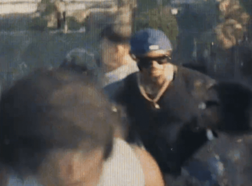 Close-up of person's feet in tan shoes