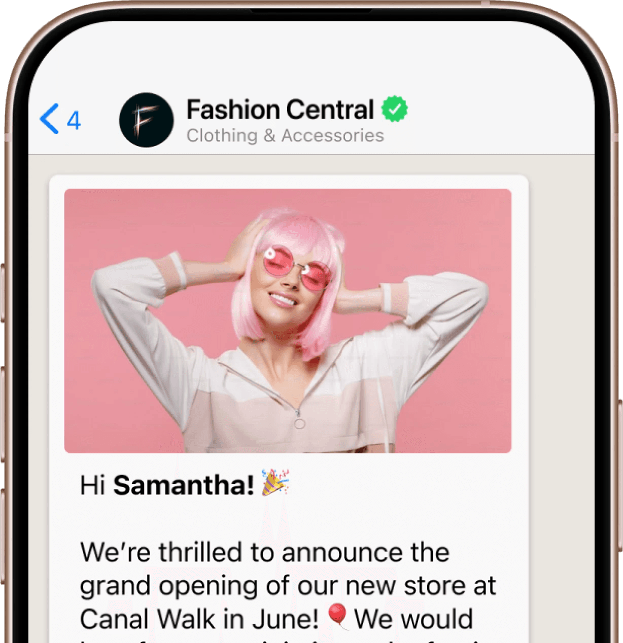 Phone screen with use case example of  WhatsApp  marketing message to drive in store visits