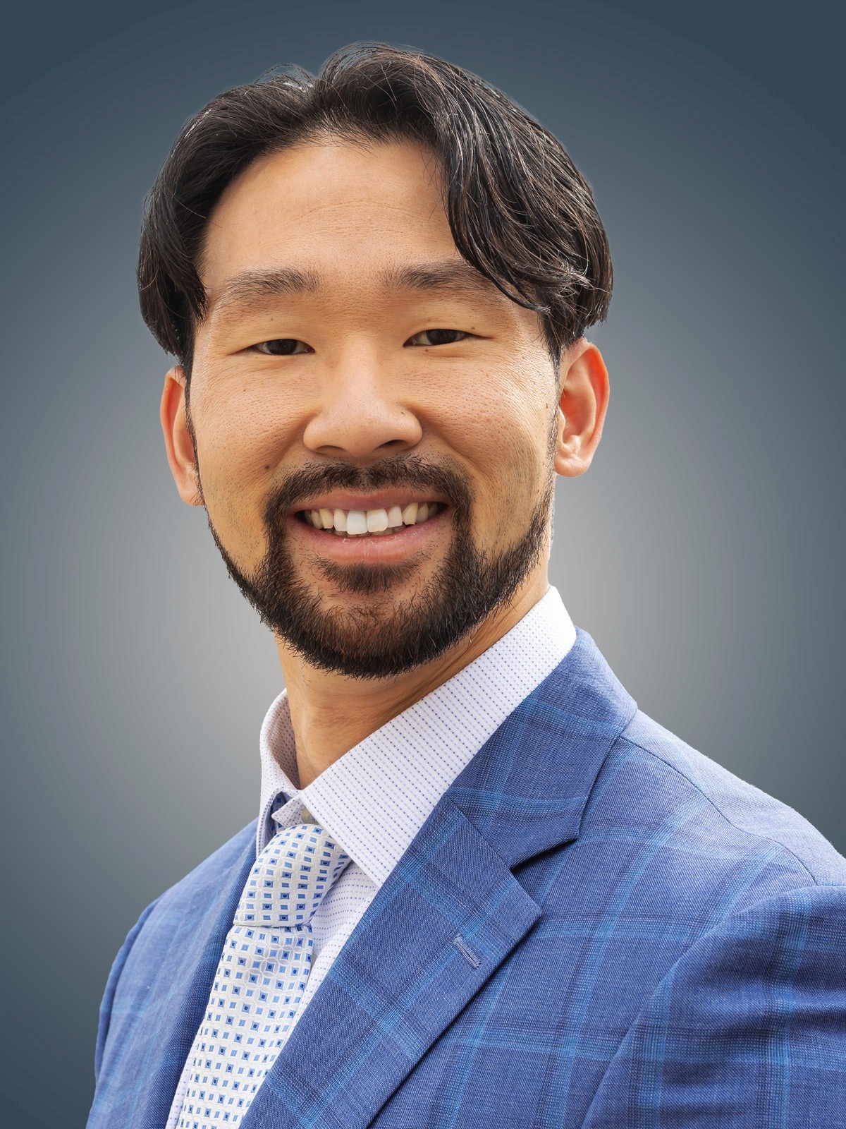 Professional man buttoning his jacket