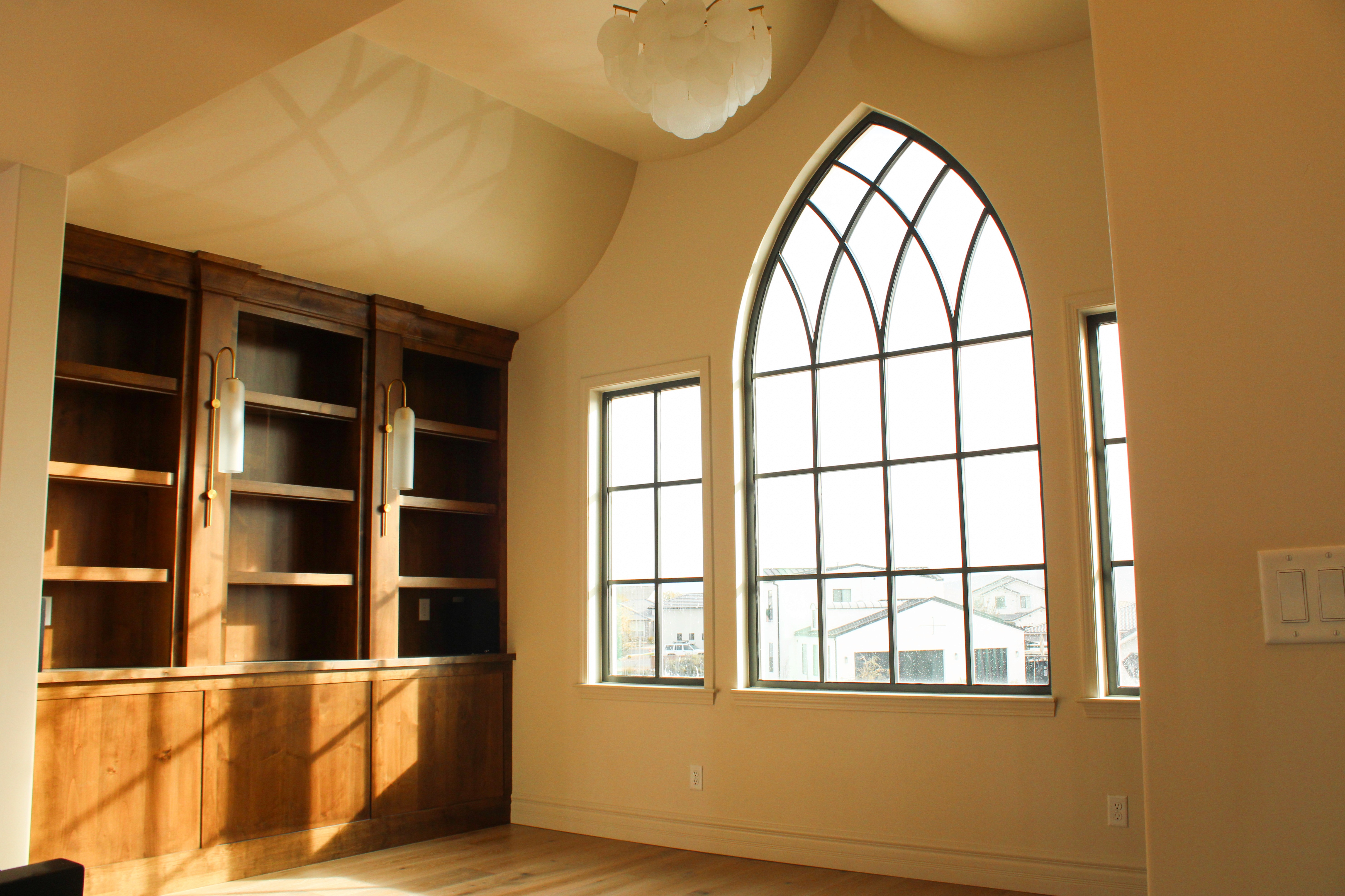 Library or reading space with custom shelving in a St. George, Utah custom home.
