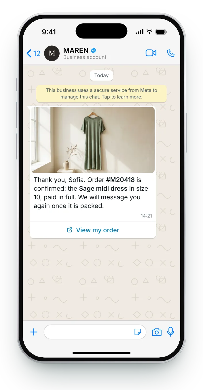 The dress they bought, confirmed: WhatsApp order confirmation on an iPhone