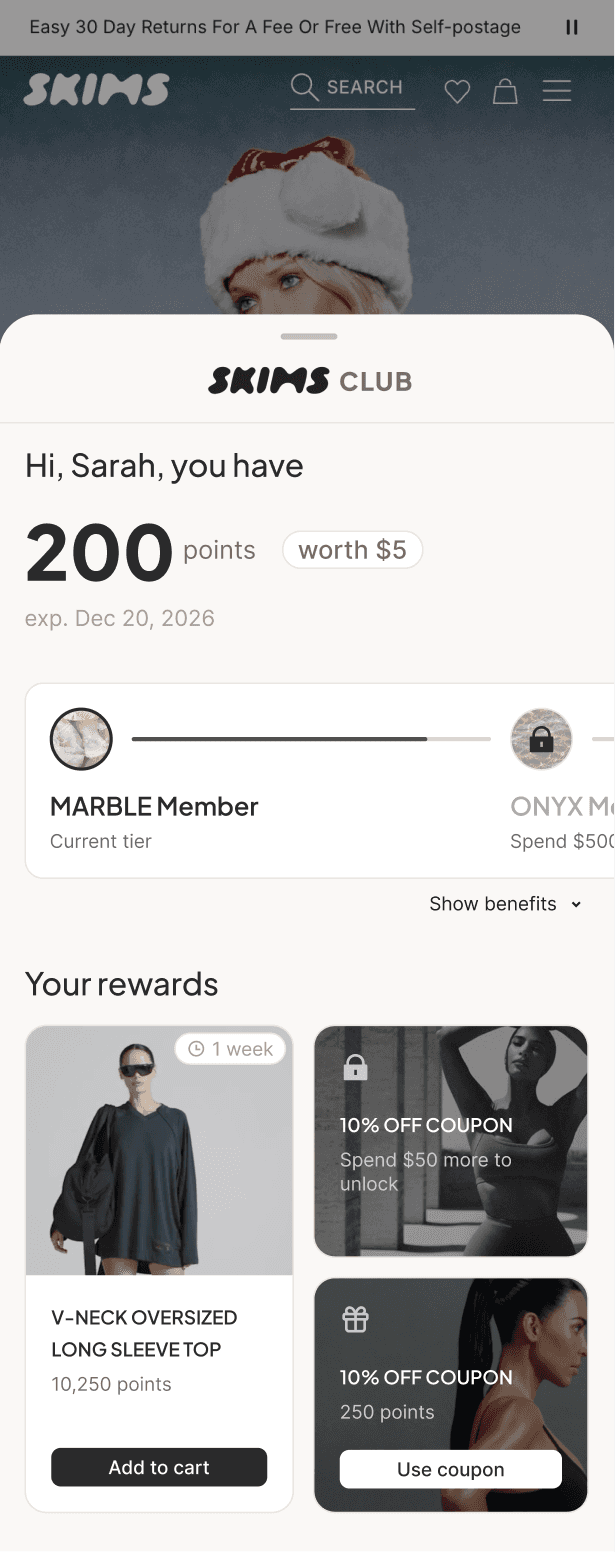 mobile UI showing the loyalty widget with a clothing store branding applied