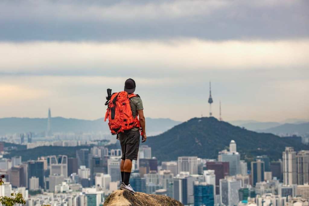 Hiker looking over Seoul, Korea