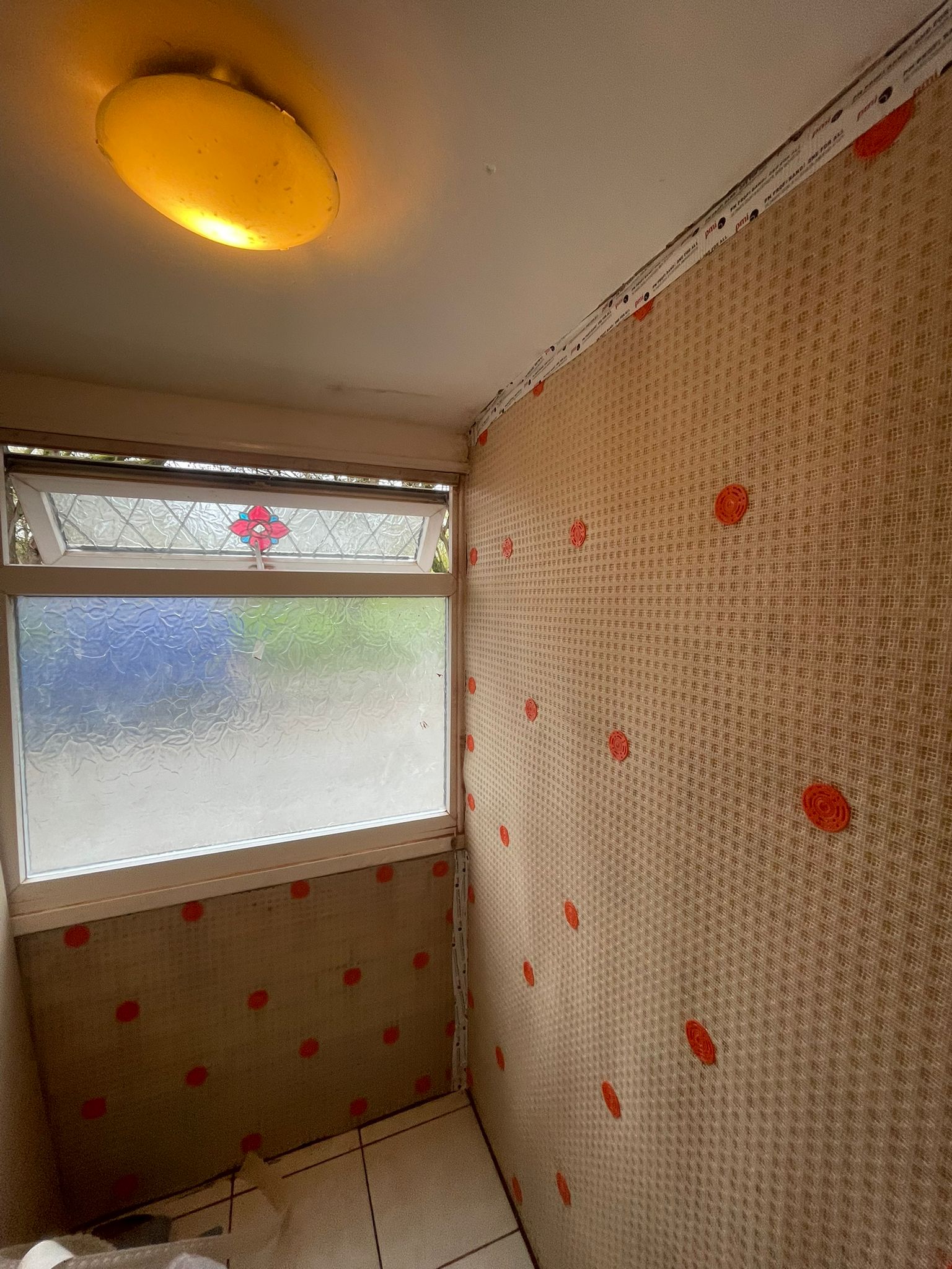 Damp proofing treatment to internal wall