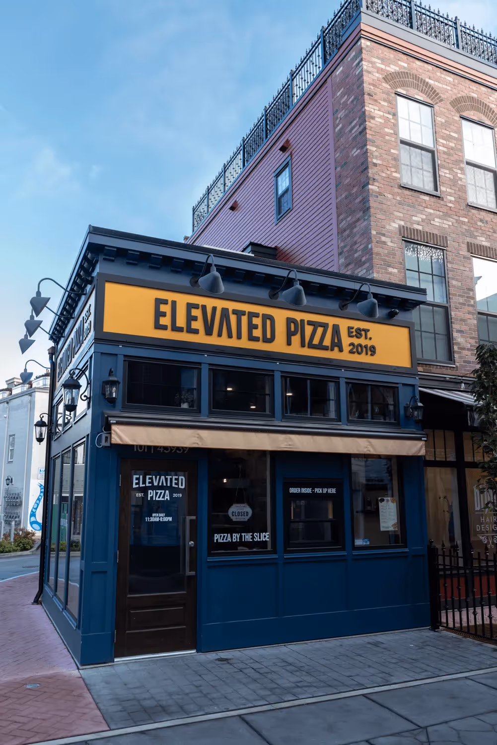Elevated Pizza architectural photography showing the project building and surrounding landscape