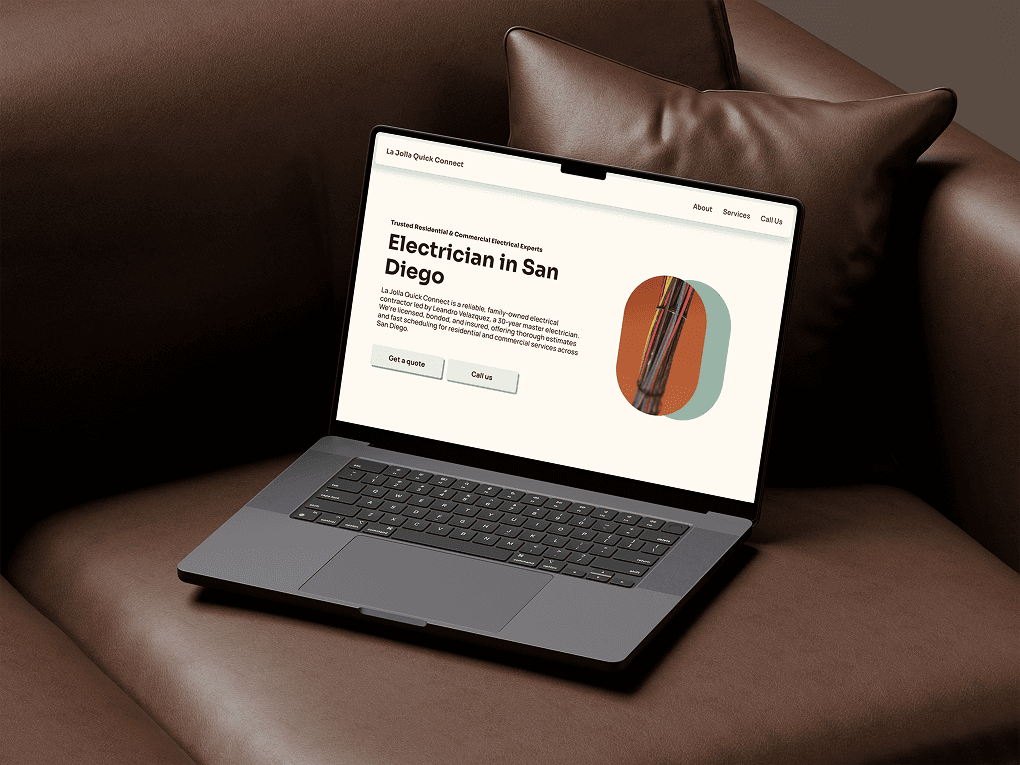 mockup of La Jolla Quick connect website open on a laptop sitting on a brown couch
