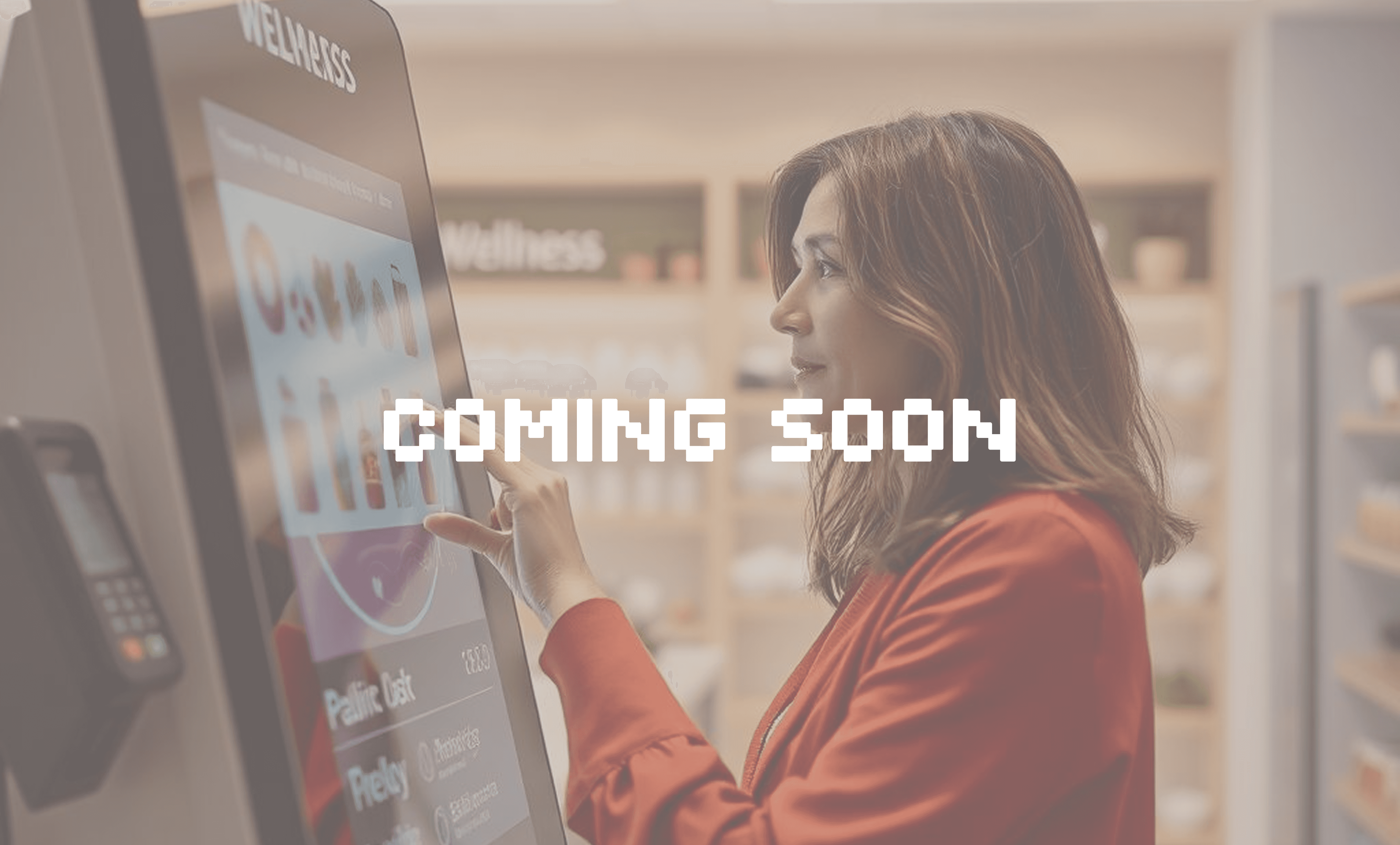 Placeholder "Coming Soon" 45 year old woman in a red shirt exploring products on a touchscreen device.