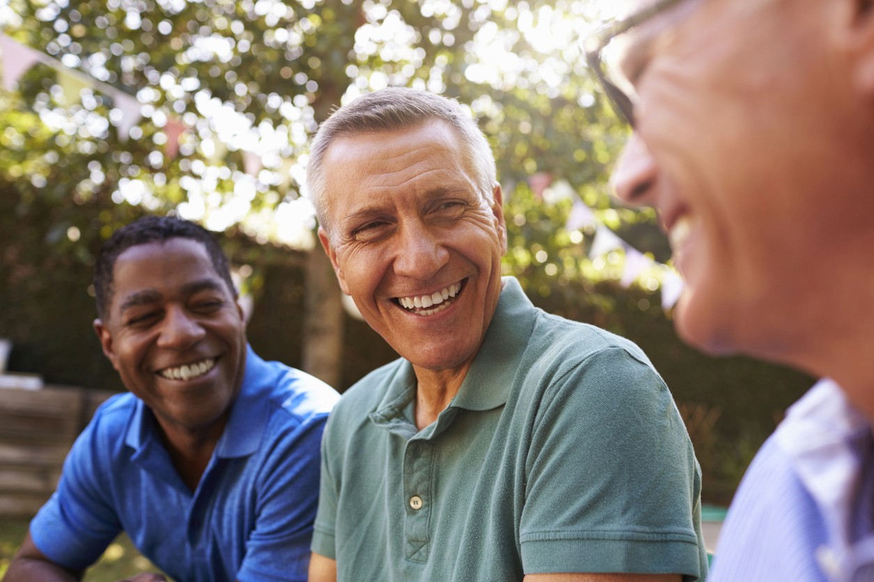 Active adult men having a conversation