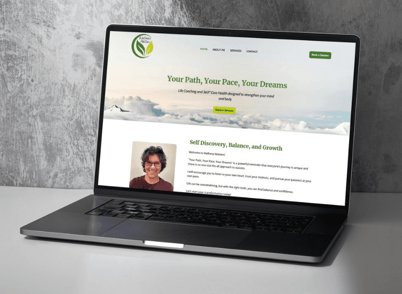 Laptop displaying the Wellness Matters website