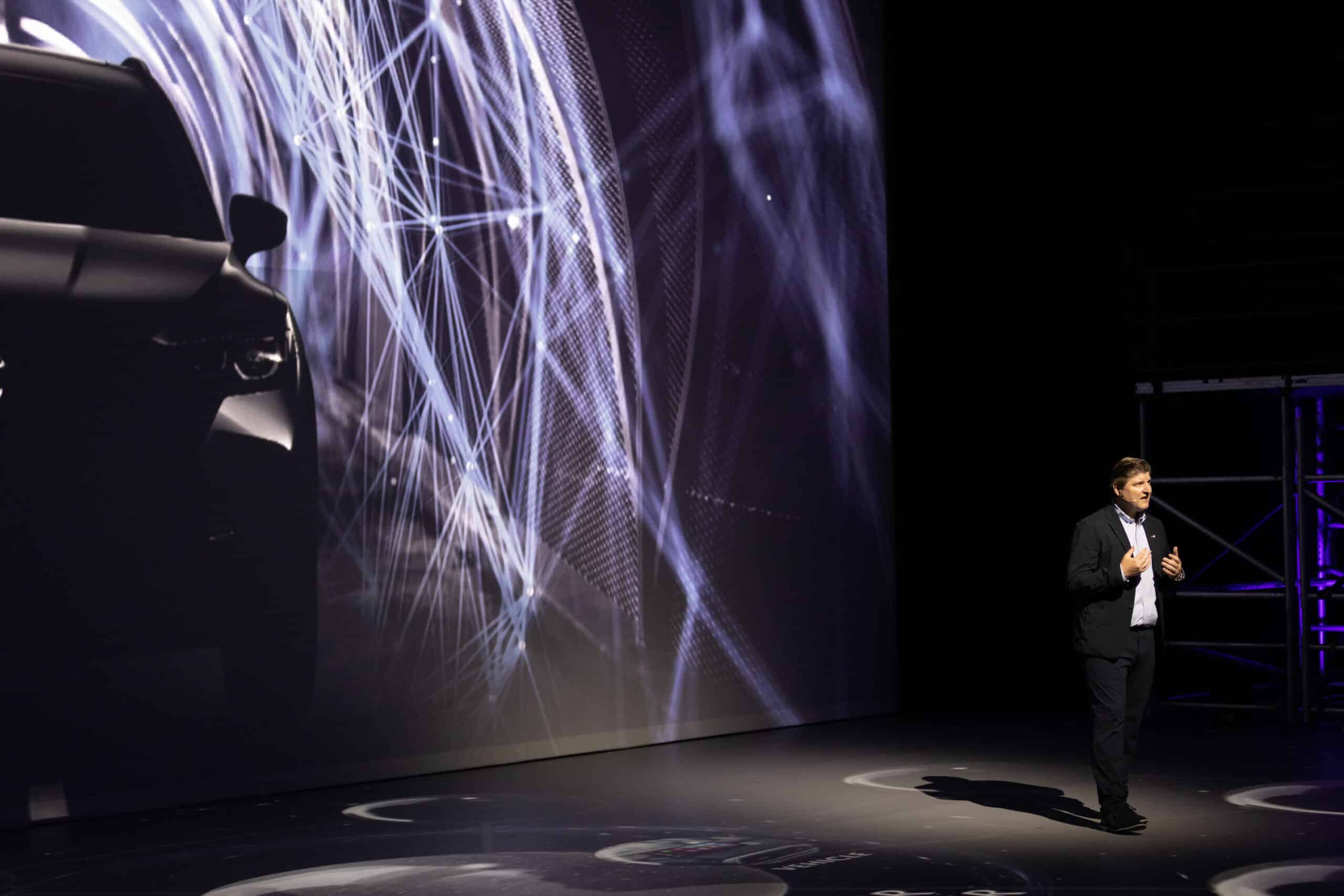 Mazda North America executive speaking on projection mapping floor
