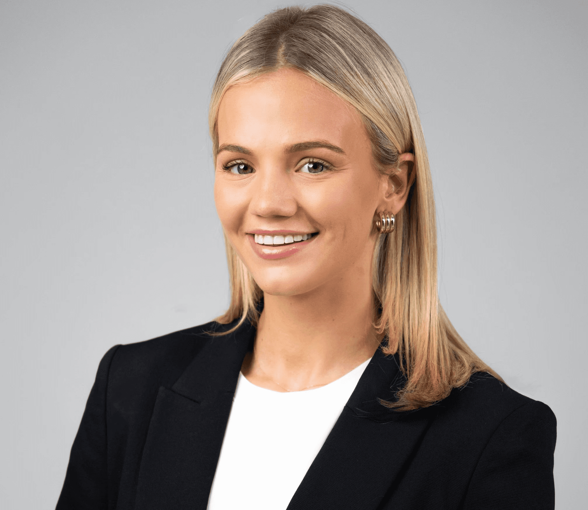 Black and white portrait of a man with a beard and glasses
