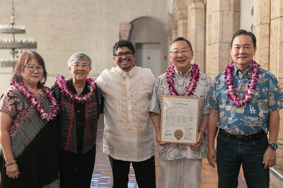 Ann Asakura, Gail Harada, Deborah Pope, Dennis Kodama and Grover Ishii posing with the honorary certificate with Councilmember Tulba.