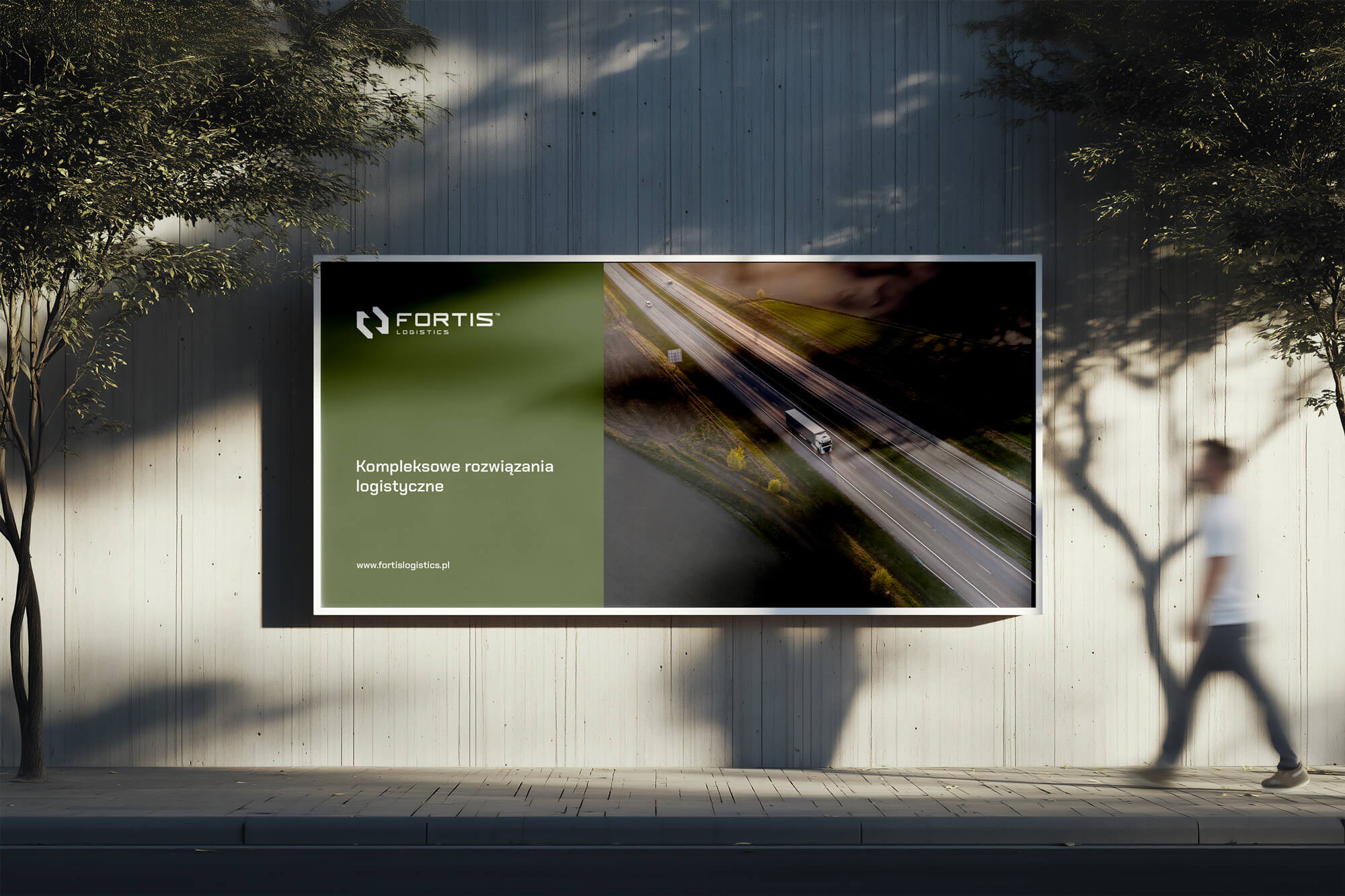 Fortis Logistics billboard advertisement featuring a truck on a highway and the slogan 'Comprehensive logistics solutions'