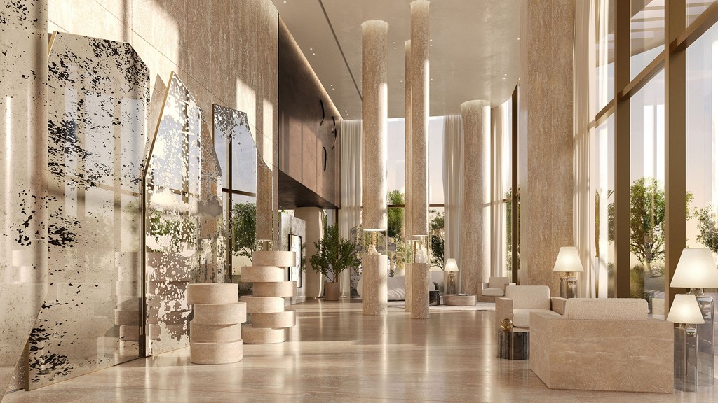A luxurious lobby featuring elegant marble columns and expansive windows, showcasing the Maison Margiela aesthetic.
