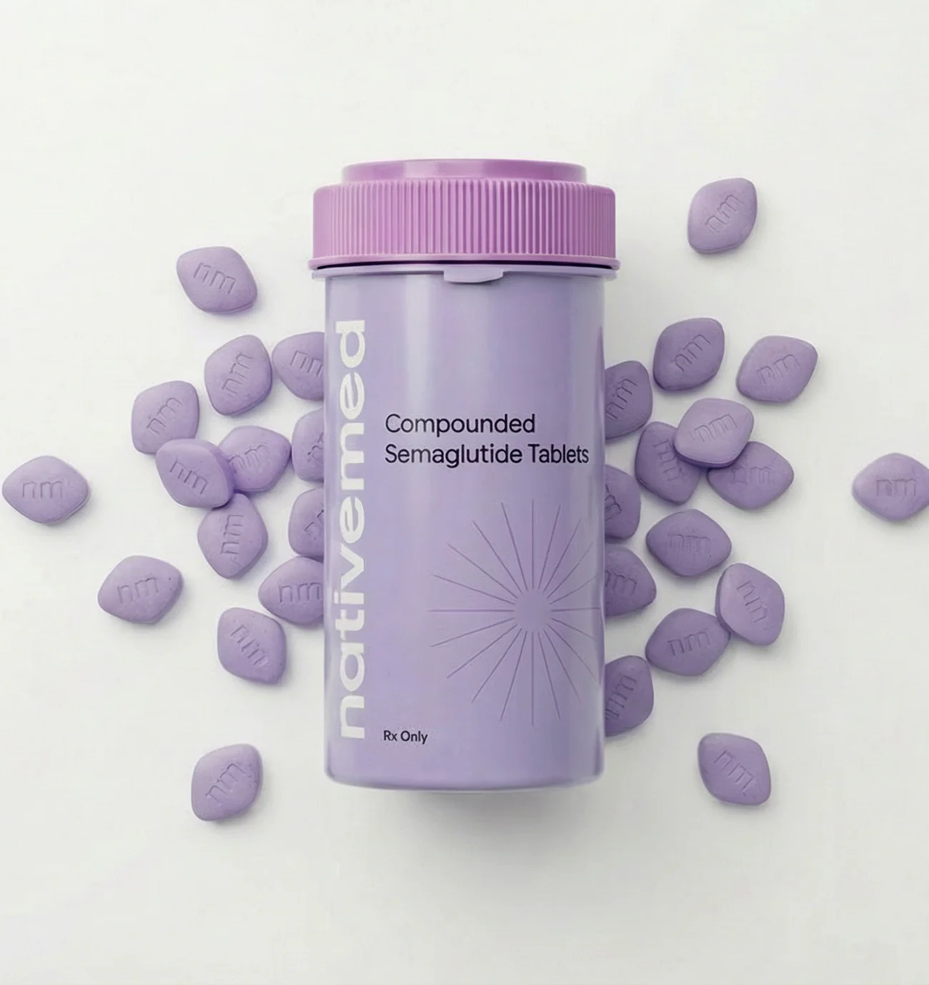 Compounded Semaglutide tablets scattered around an open NativeMed bottle
