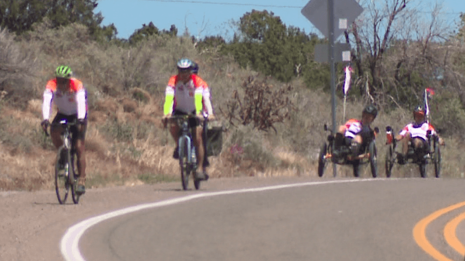 Team Route 66 bicyclists with Parkinson's roll on famed road