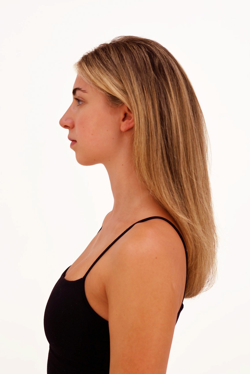 left side-profile headshot of female dancer