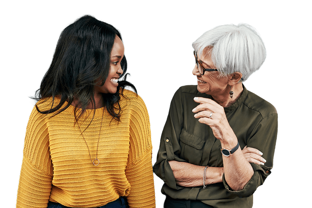 Female of colour wechatting with mature lady with white hair and glasses