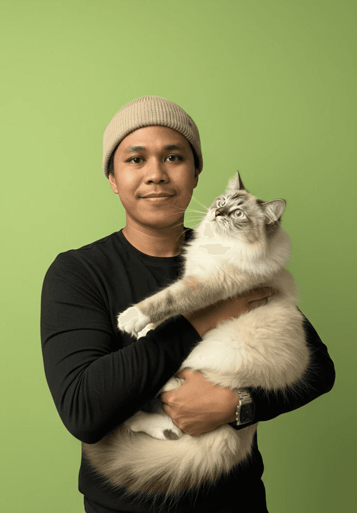 a blurry photo of a person standing in front of a wall