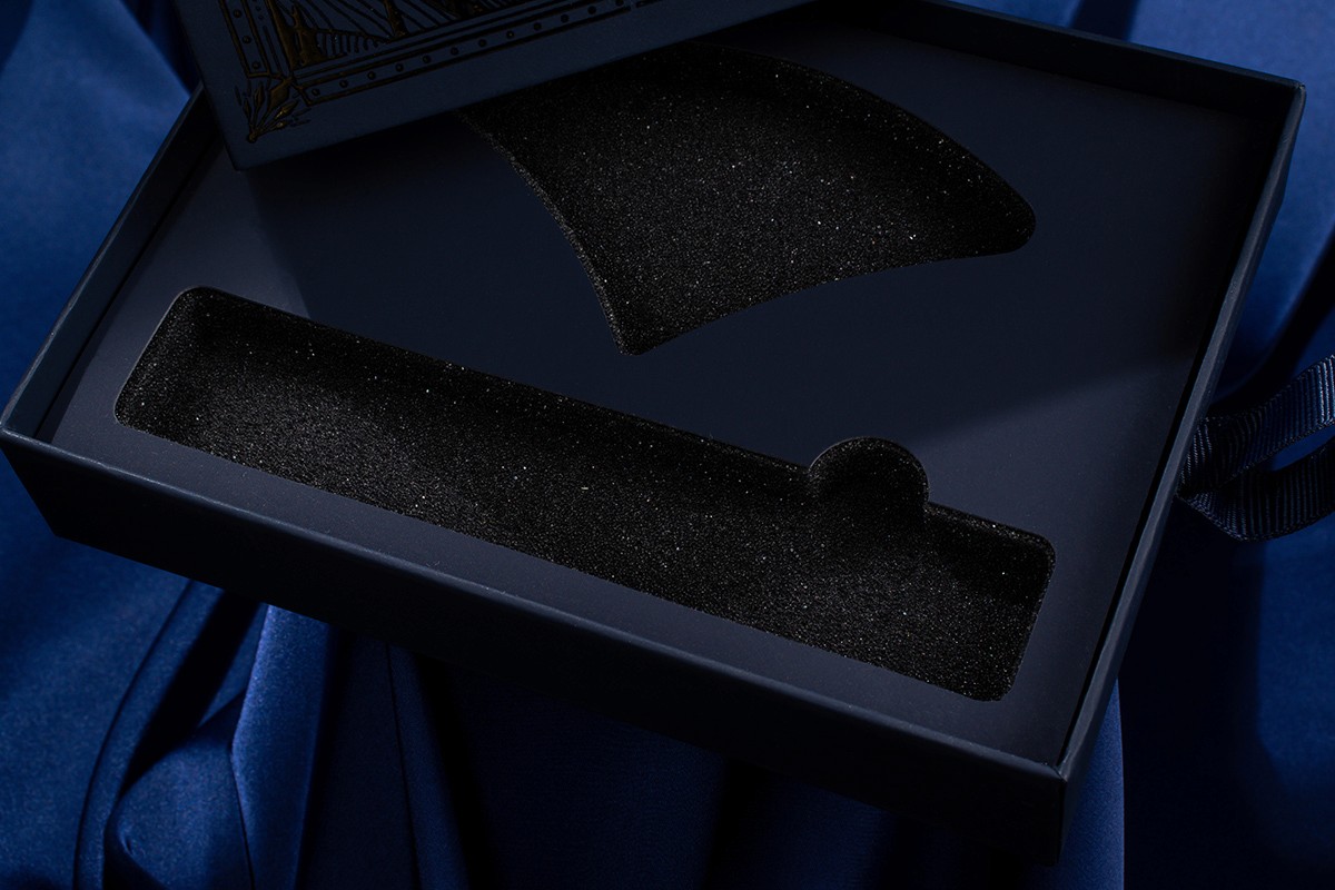 Rigid boxes, boxes, packaging for Corporate client printed on designer paper, binding board with mounting to board, raised foil stamping.