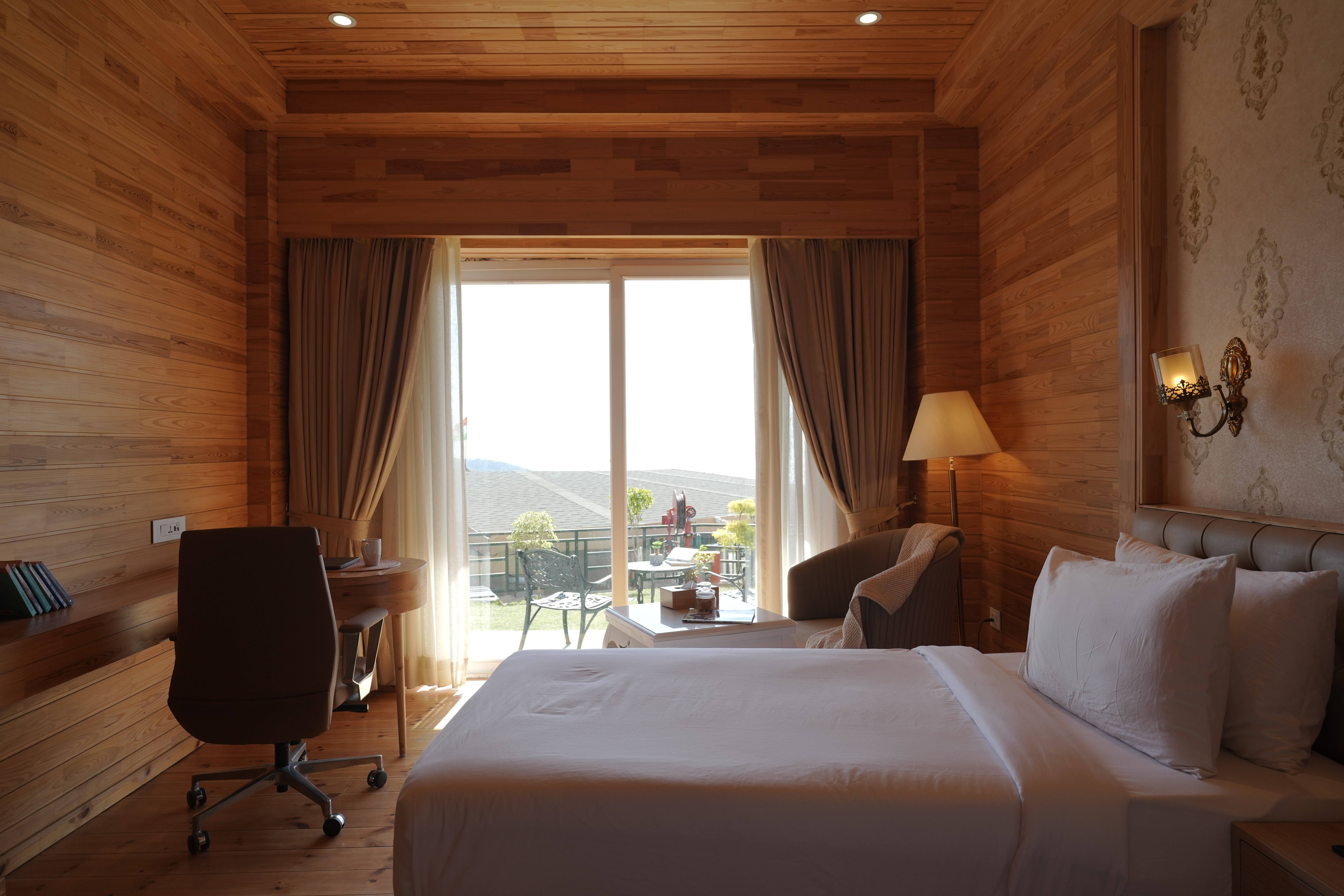 white bed linen on bed