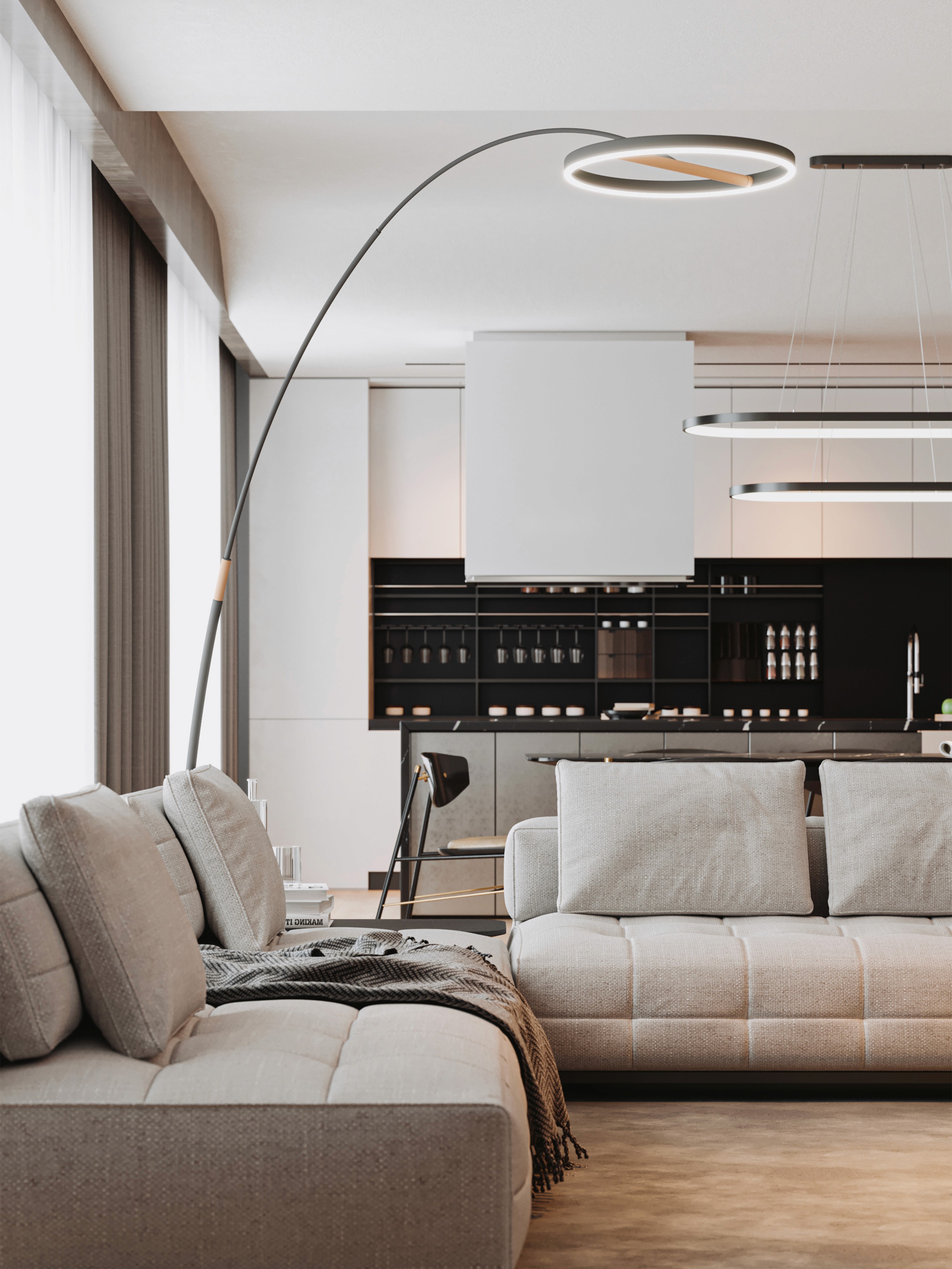 Visualizzazione 3d di zona living accogliente dai toni neutri con divano soffice e texture a contrasto. Design contemporaneo caratterizzato da iconica lampada a stelo curvo e continuità visiva con la cucina moderna retrostante.