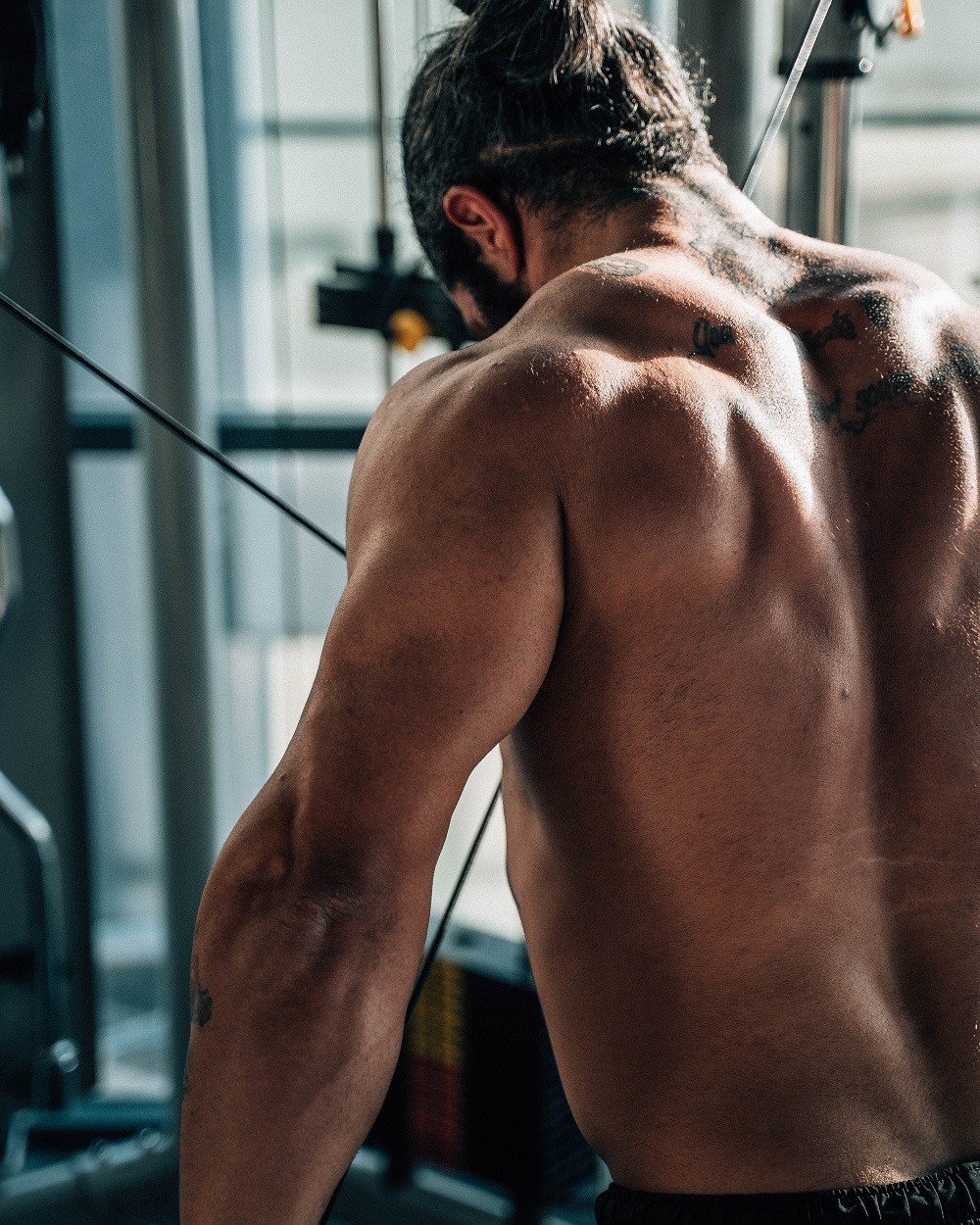 Rachel Stone, personal trainer and fitness coach, smiling in natural light
