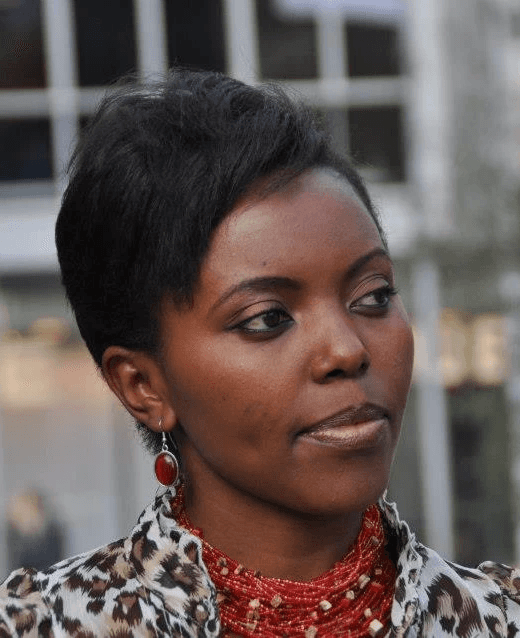 Girl standing in pasted colorful background