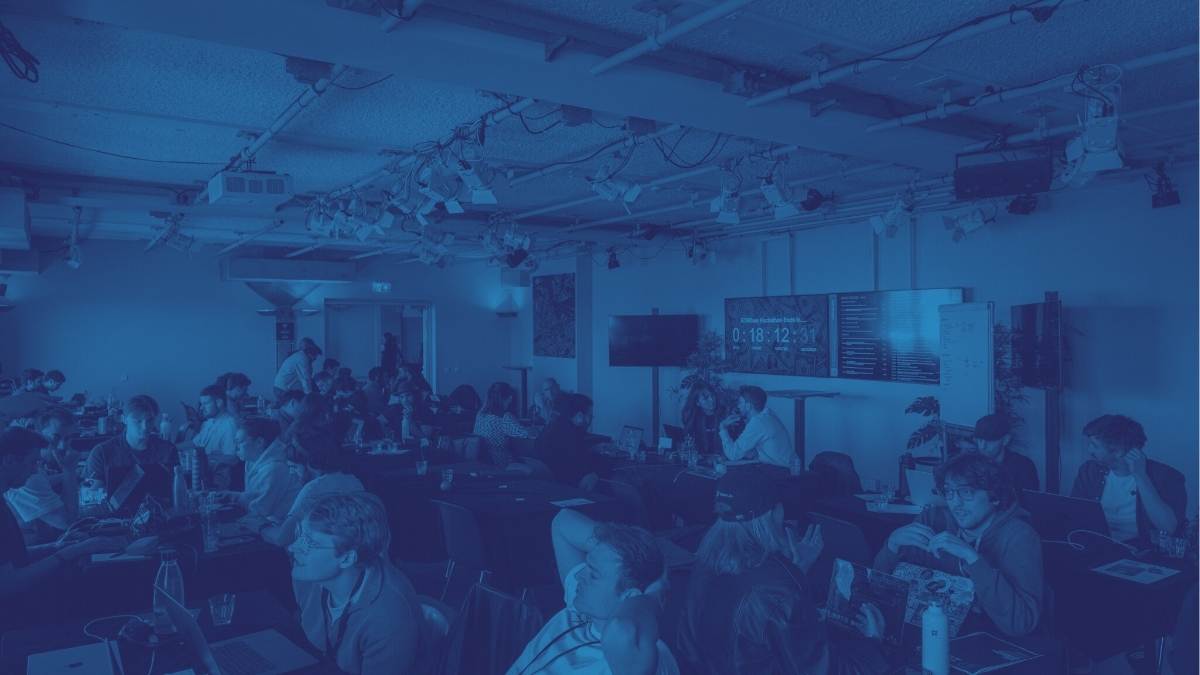 A company of people in a concert hall