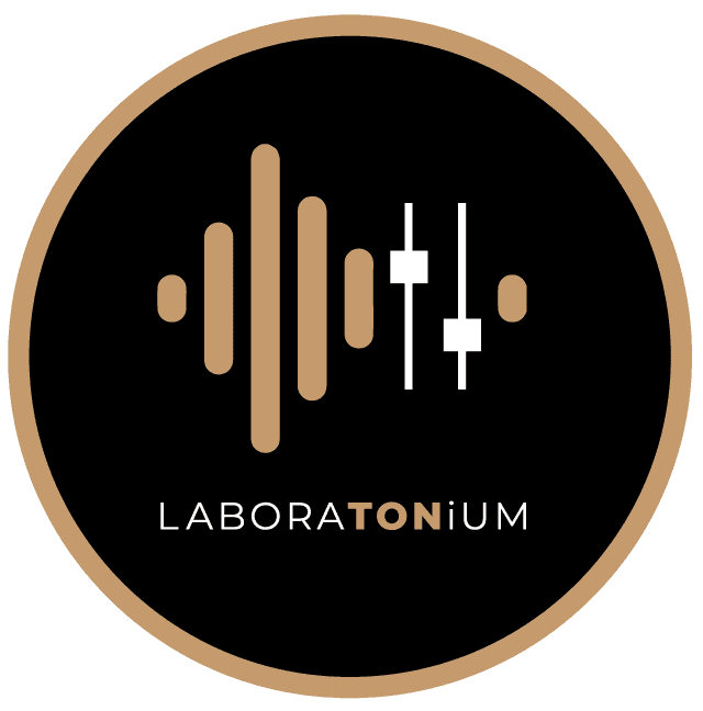 Profile portrait of a man in a grey shirt