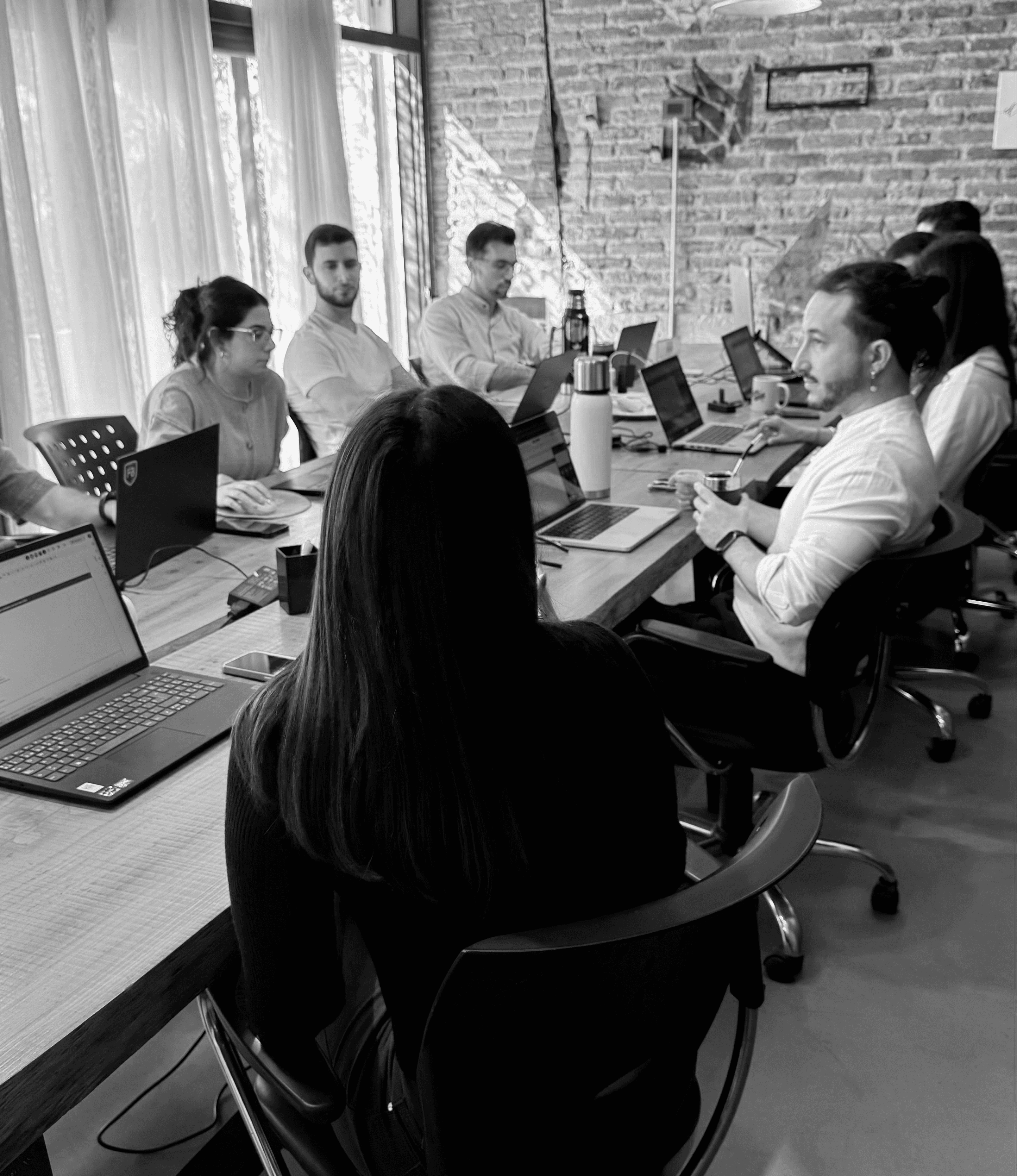 Team siting at the table