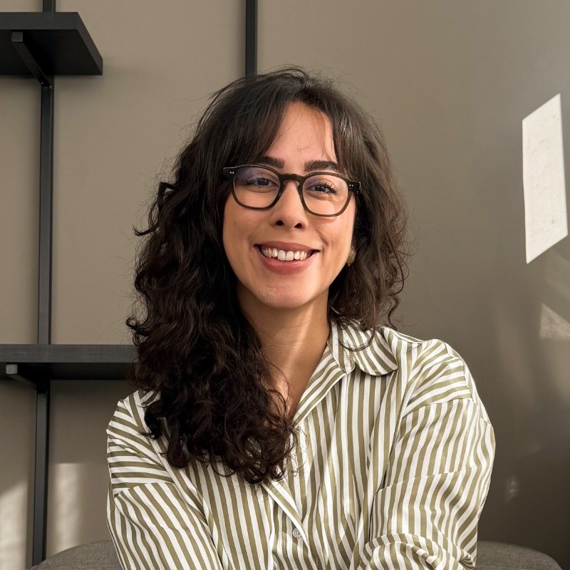 man crossing both arms