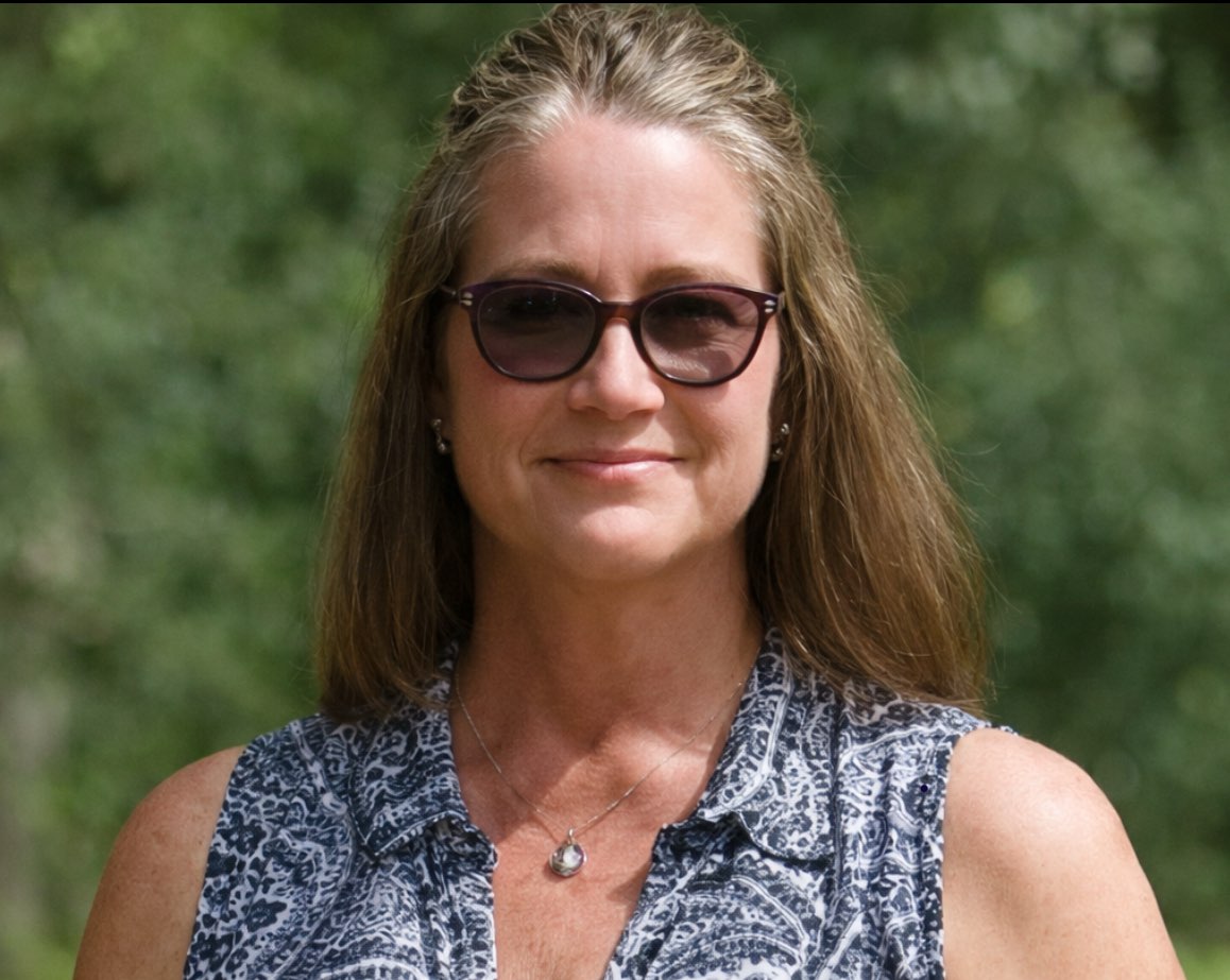 a woman in a blue dress