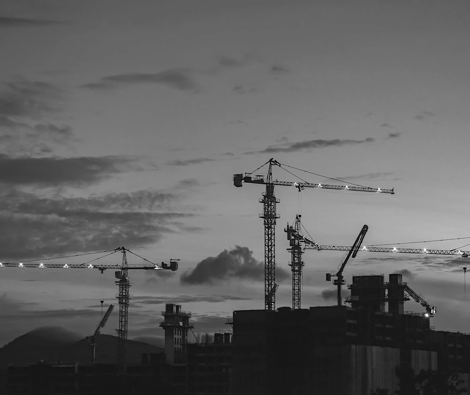 Baukartell Baukran Gebäude Baustelle Schwarzweiß