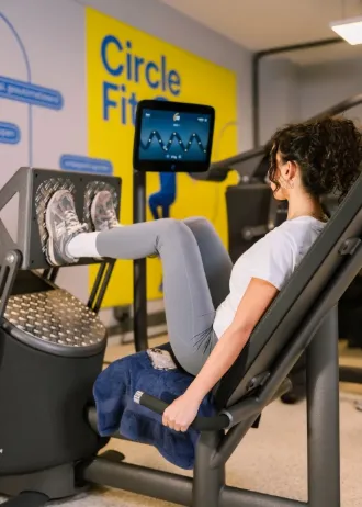 A gym interior with modern equipment.