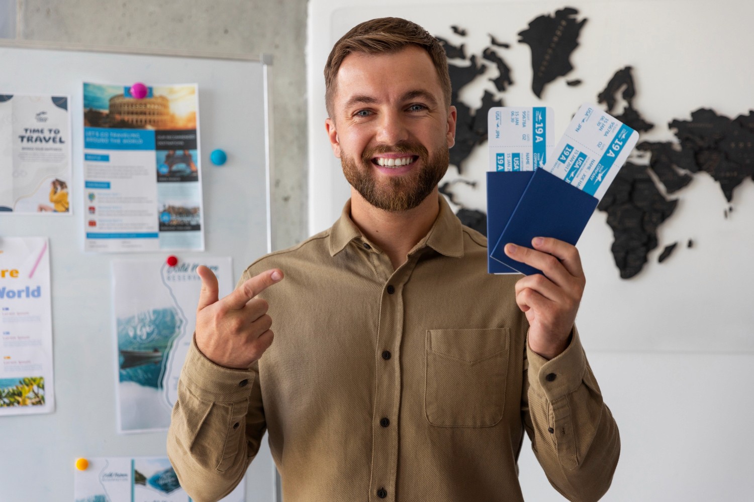 Happy man with passport and boarding passes