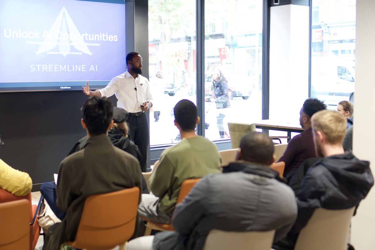 people sitting on chair in front of laptop computers