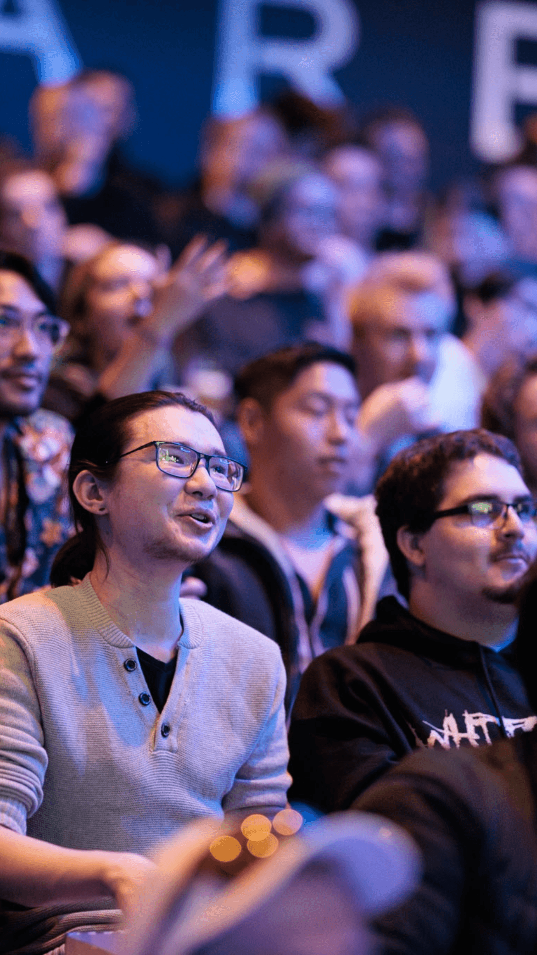 audience watching esports event in grandstand