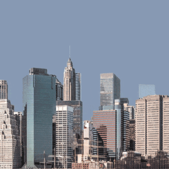 A massive cat walking upright though a city like Godzilla