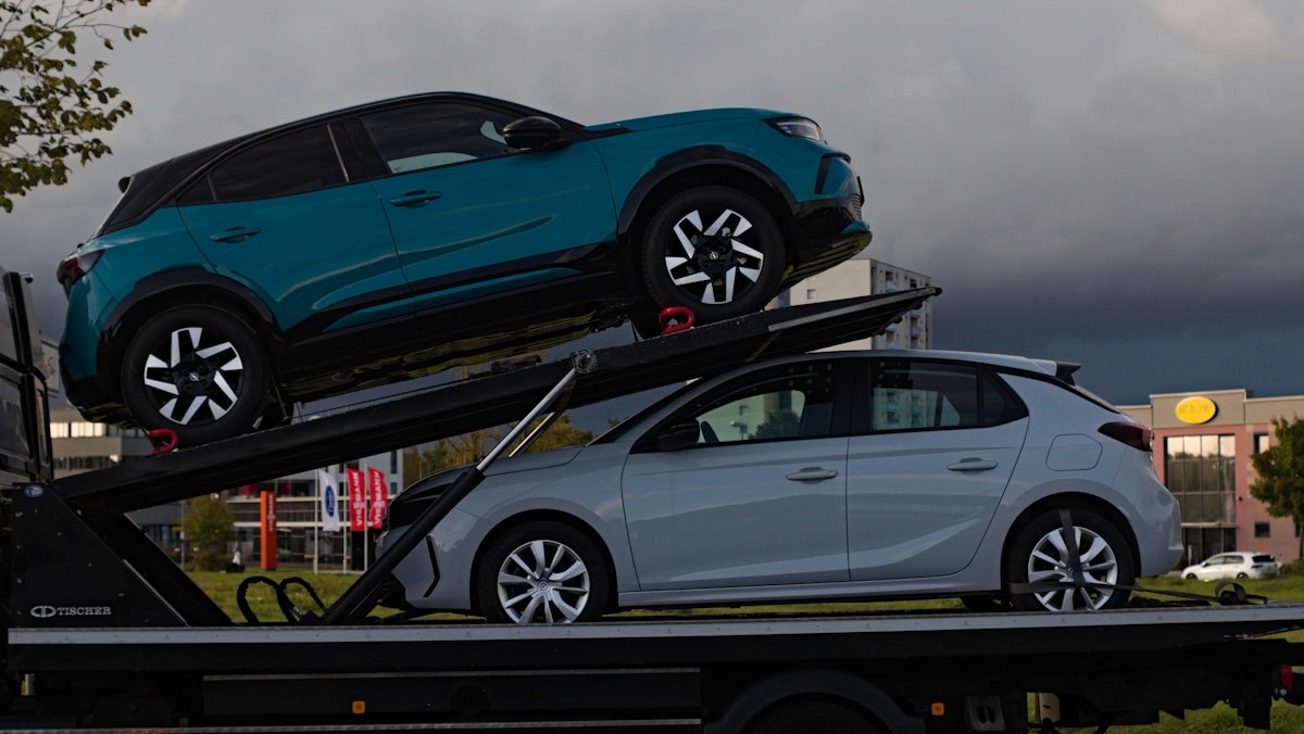 Cars loaded onto a transporter truck