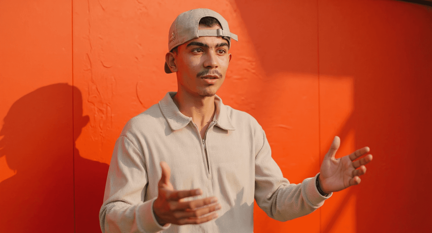 Change to gesturing posture as if explaining something.