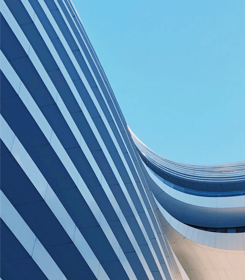 five children smiling while doing peace hand sign